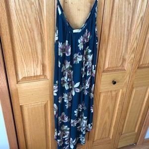 Teal floral spaghetti strap jumpsuit. Just In brand.Size L. Mid calf len…
